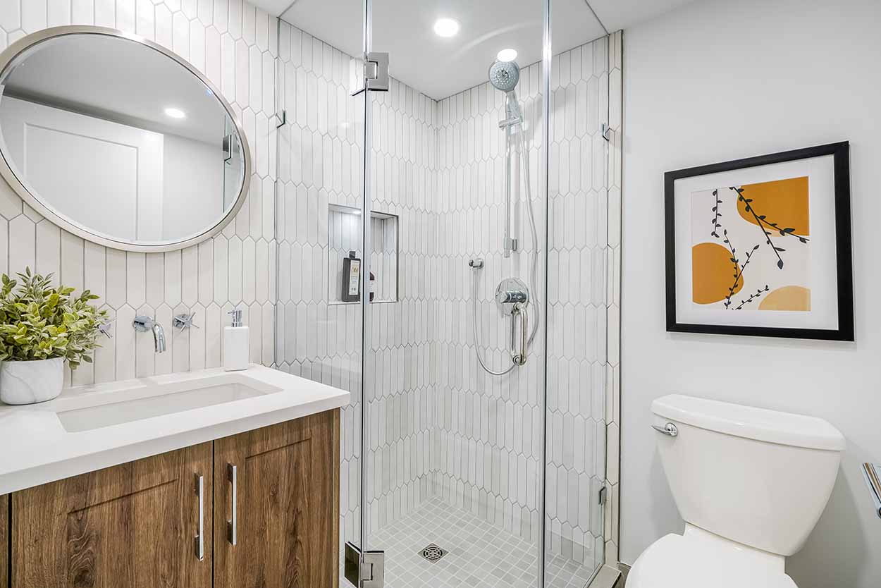 bathroom-renovation-vancouver-townhouse-white-tiles-wood-cabinets